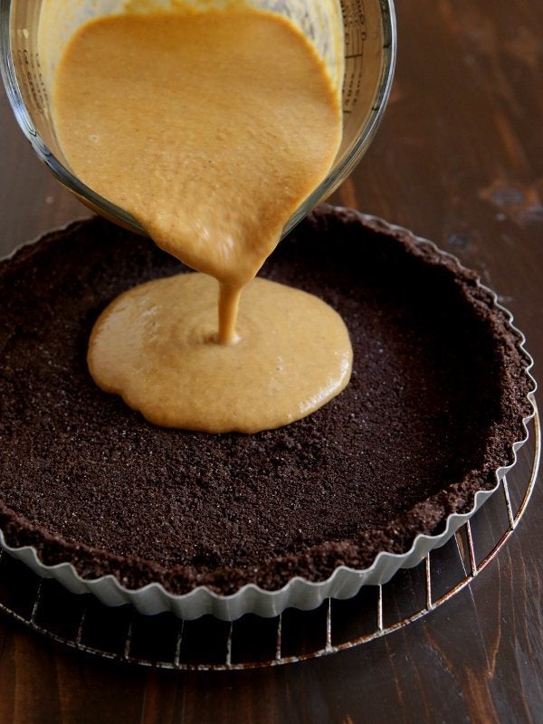 Get the recipe for this Chocolate Swirl Pumpkin Tart with Chocolate Cookie Crust from Completely Delicious