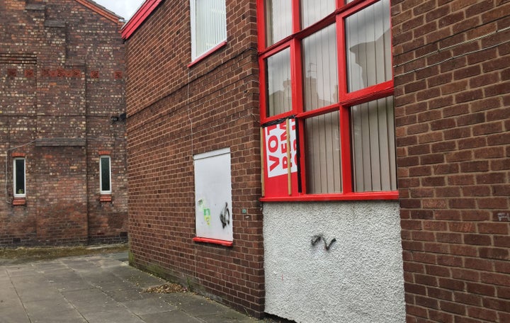 The boarded up window in Eagle's constituency office