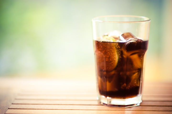 Consuming a lot of soda or other sugary drinks may be tied to an increased risk for some rare cancers.