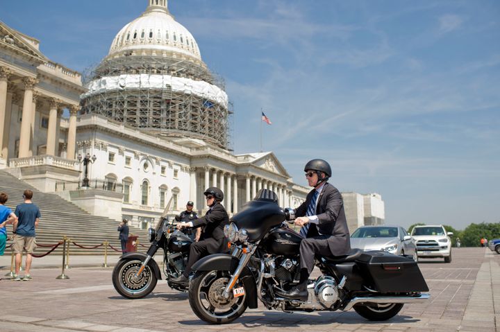 This is a real picture of GOP Reps. Reid Ribble (left) and Scott Rigell, who co-sponsored the Social Security bill, riding their motorcycles at the Capitol in May 2016.