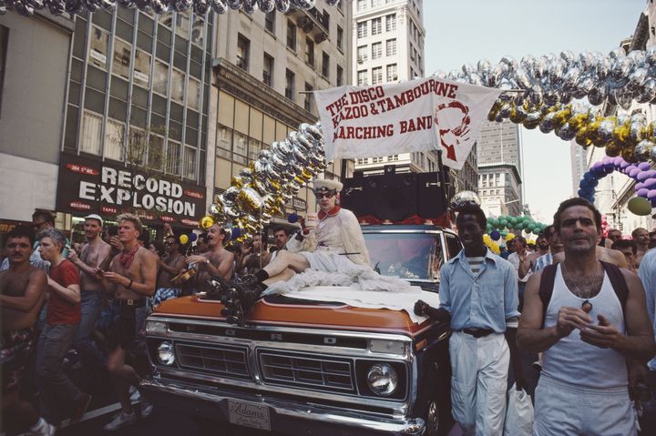 Dancing on the street during the Gay Pride parade in New York City, USA, June 1986.