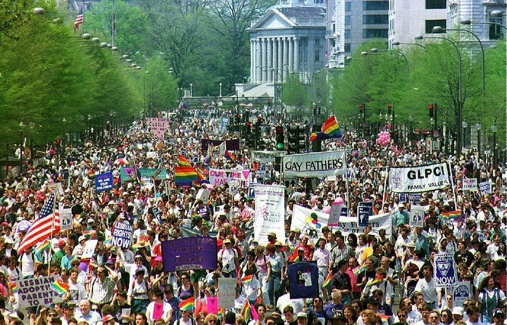 Hundreds of thousands of gay-rights demonstrators march down Pennsylvania Avenue in downtown Washington D.C. 25 April 1993.