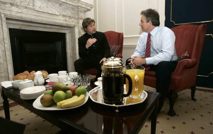 Oliver with Tony Blair, after delivering a petition demanding better school food