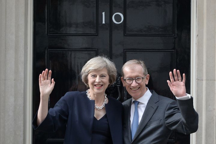 Theresa May and husband Philip on her first day in office