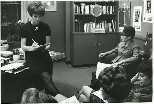 Helen Gurley Brown leading a <i>Cosmopolitan</i> editorial meeting in the 1960s.