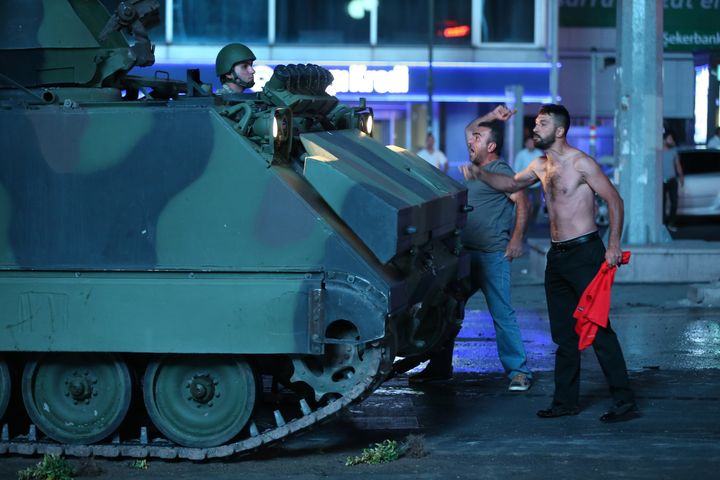 People react against uprising attempt from within the army in Ankara, Turkey on July 16, 2016.