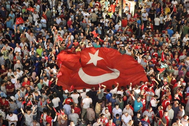 People react against the attempted coup in Ordu, Turkey, on Saturday.