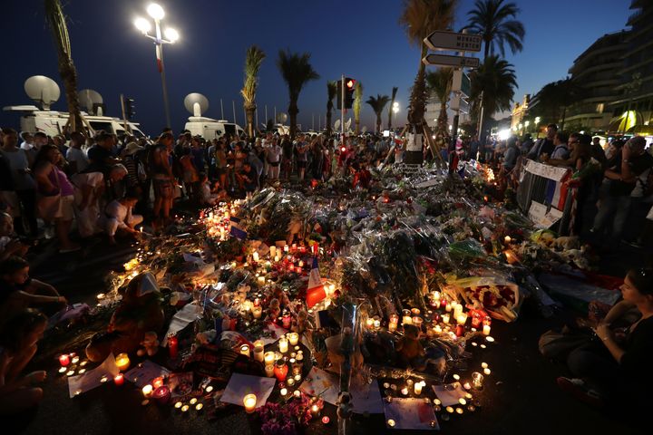 <strong>Crowds gather at a memorial on the Promenade des Anglais in Nice.</strong>