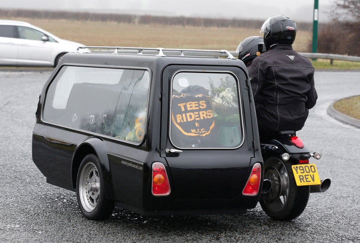 <strong>The coffin arrives at the funeral of Mick Collings, who died in the Didcot accident</strong>