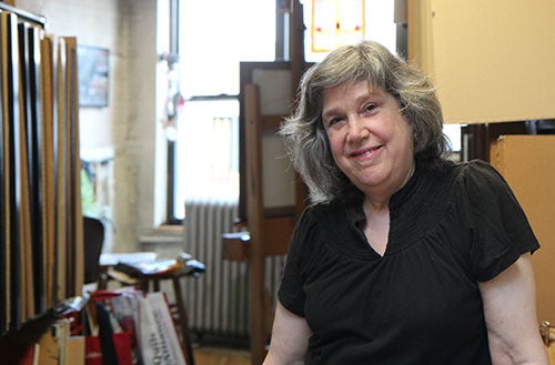 <em>Photo by Nancy A. Ruhling</em><br><strong>Sharon paints the city fantastic.</strong>
