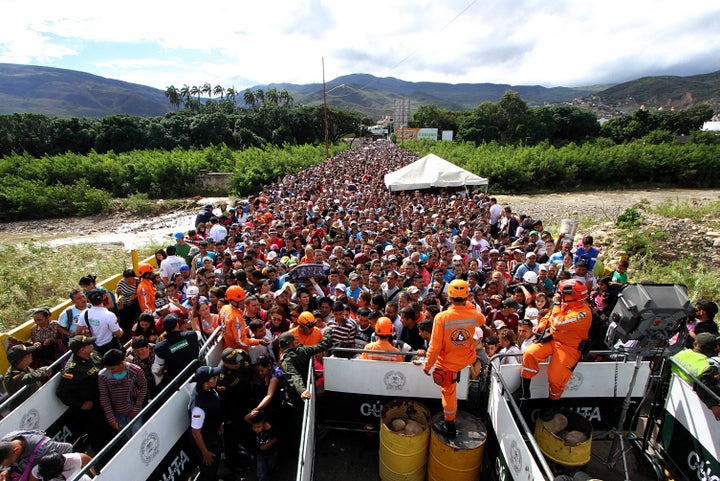 Venezuelans cross the Simon Bolivar bridge linking San Antonio del Tachira, in Venezuela with Cucuta in Colombia.