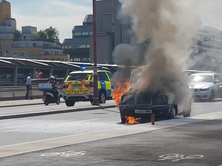 The black cab on Blackfriars Bridge just before midday