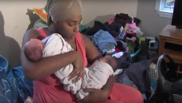 Super mom Danesha Couch is seen juggling her two newborn twins, Dalanie and Darla in her Kansas City, Kansas home.