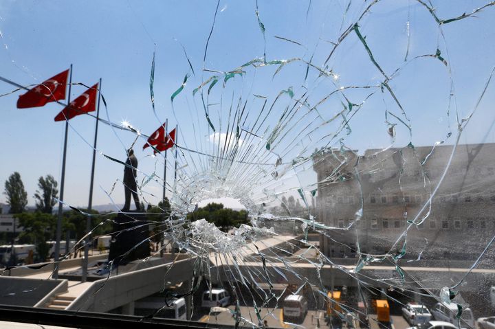 A damaged window is pictured at the police headquarters in Ankara, Turkey, on July 18.