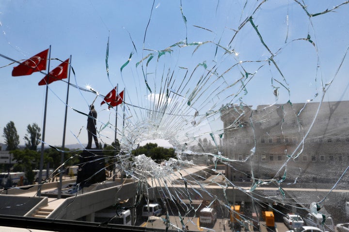 A damaged window is pictured at the police headquarters in Ankara, Turkey, on July 18.