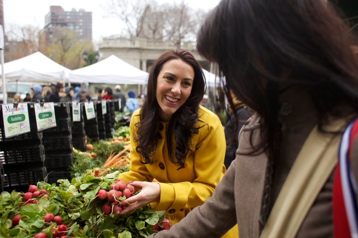 Tara Magalski, showing her client how to shop the Union Square Farmer's Market.