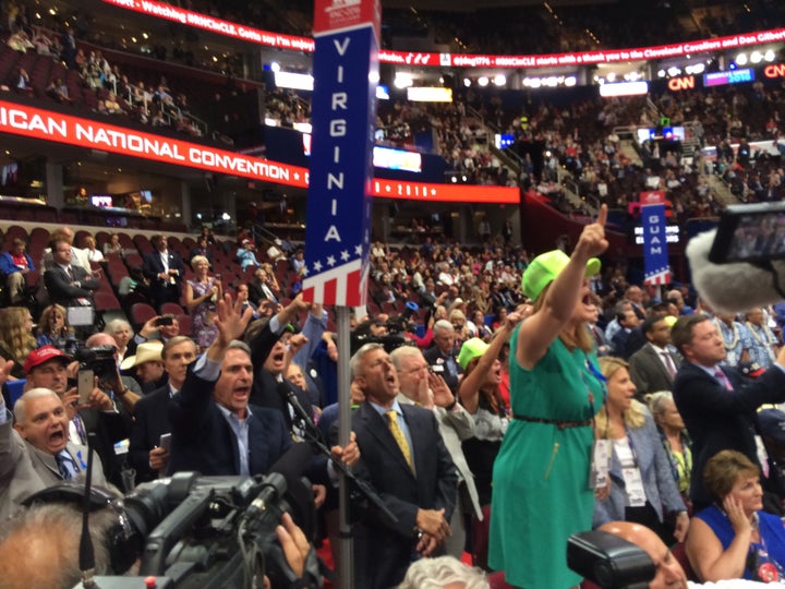 Virginia delegate Ken Cuccinelli (second from left) and others from Virginia shout during the rules votes.