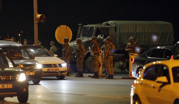 Turkish soldiers are seen on the Asian side of Istanbul, Friday, July 15, 2016. A group within Turkey's military has engaged in what appeared to be an attempted coup, the prime minister said, with military jets flying over the capital and reports of vehicles blocking two major bridges in Istanbul. Prime Minister Binali Yildirim told NTV television: "it is correct that there was an attempt," when asked if there was a coup. 