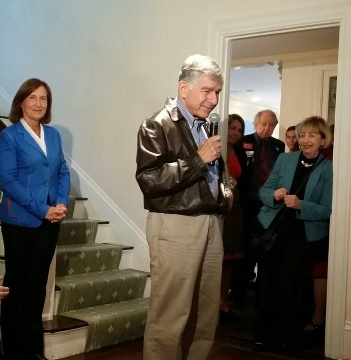 Michael S. Dukakis speaks at the home of Massachusetts State Treasurer Deborah Goldberg (l). Massachusetts State Senator Cynthia Stone Creem looks on.