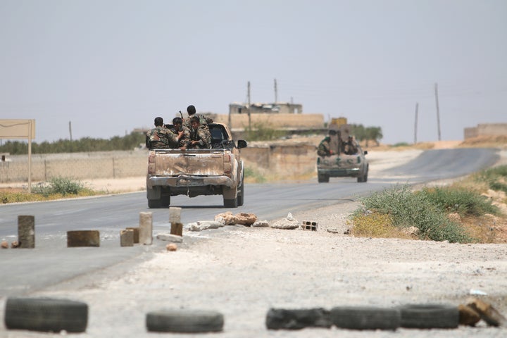 An attack on ISIS-held territory in Syria that is believed to have been carried out by U.S.-led warplanes left more