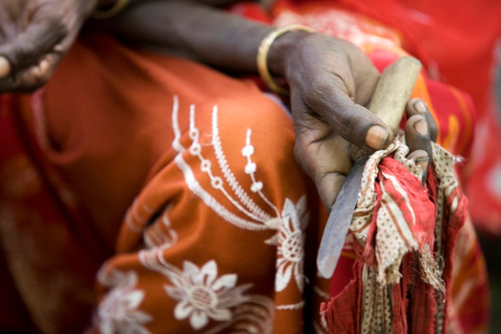 Boko Mohammed, a former practitioner who performed FGM, holds the tool she used for the procedure, at community meeting in Amibara District, Ethiopia.