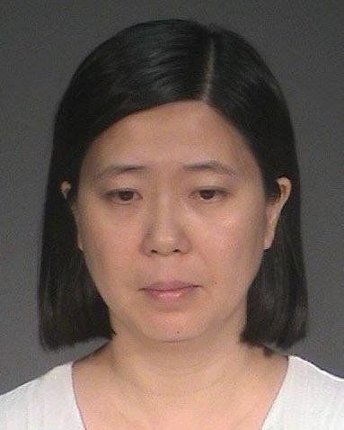 Lili Huang, 35, of Woodbury, Minnesota, faces five felony charges after allegedly enslaving and beating a nanny she brought over from China.