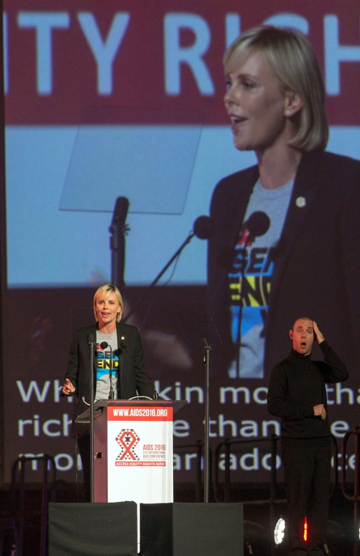 South Africa actress Charlize Theron speaks on stage during the official opening of the 21st International AIDS conference at the International Convention Centre in Durban on July 18, 2016. More than 18,000 scientists, campaigners and donors opened a major AIDS conference in South Africa issuing stark warnings that recent gains in the fight against the disease were under threat. / AFP / RAJESH JANTILAL (Photo credit should read RAJESH JANTILAL/AFP/Getty Images)