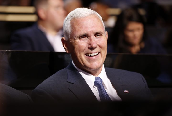 Mike Pence, presumptive 2016 Republican vice presidential nominee, smiles during the Republican National Convention in Cleveland on Monday.