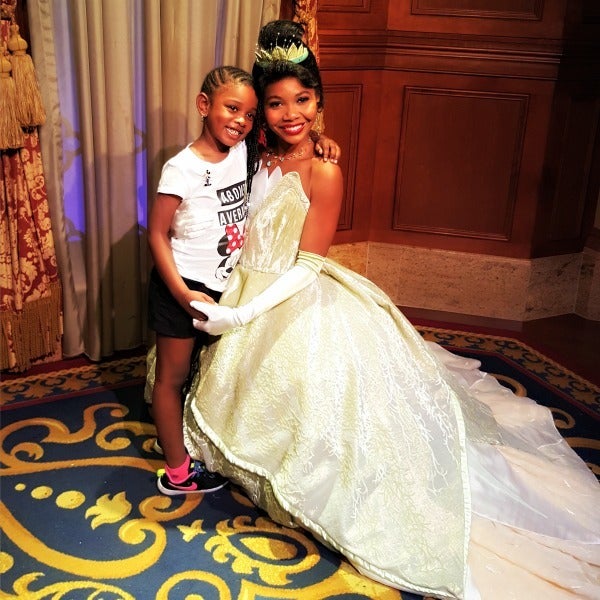 Makayla-Ola meets Princess Tiana. <strong>Note: Princess Tiana is located in Magic Kingdom, not at Akershus Royal Banquet Hall.</strong>
