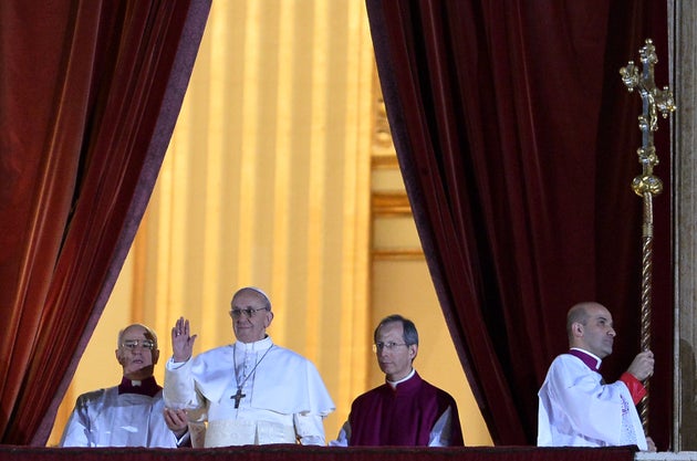 Francis appears at St. Peter's Basilica after being elected the 266th pope of the Roman Catholic Church on March 13, 2013.