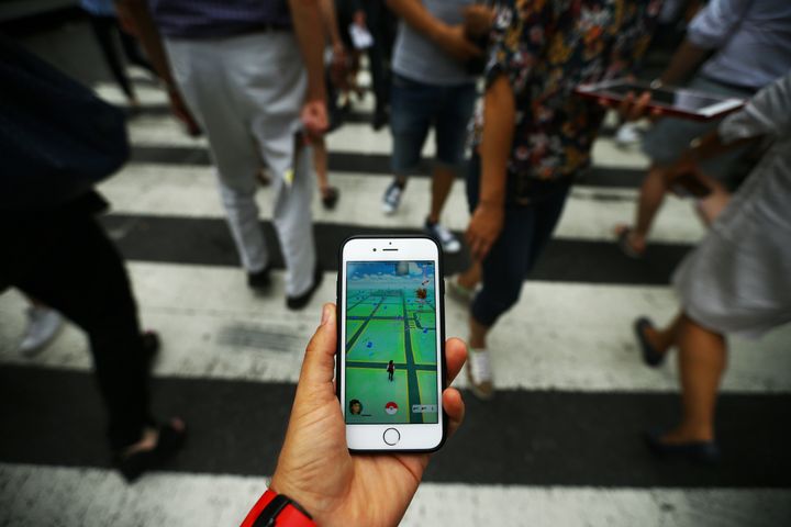 Walking while playing "Pokemon Go" in New York City, July 13, 2016.