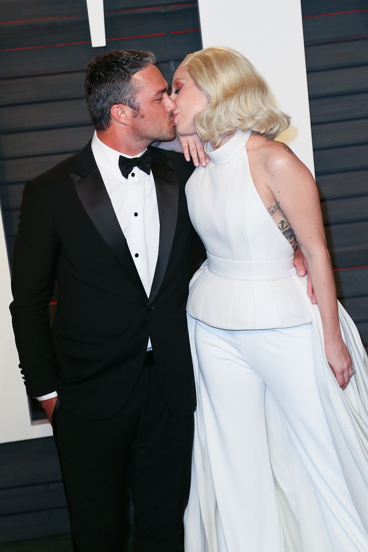 Gaga and Taylor at this year's Oscars, just two weeks after getting engaged