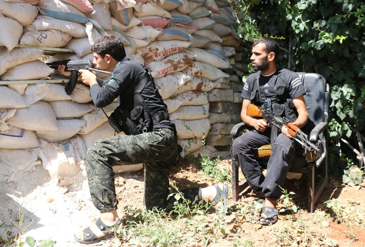 Fighters from the Syrian rebel group the Nour al-Din al-Zinki Movement pictured in 2014.