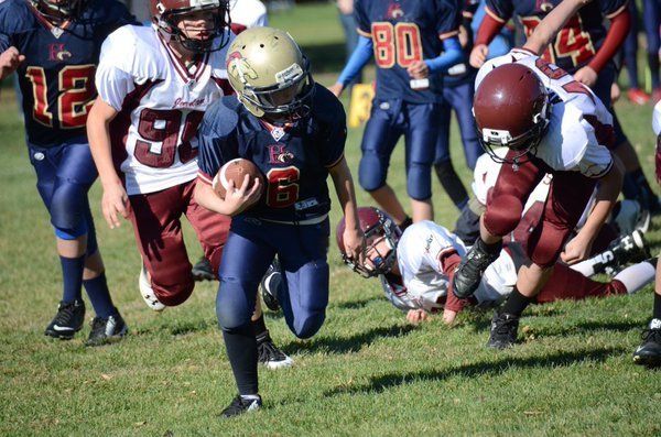 Tackle football could put kids at risk for head injuries while their brains are still developing. 