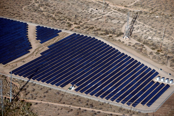 An array of solar panels in the desert in Victorville, California.