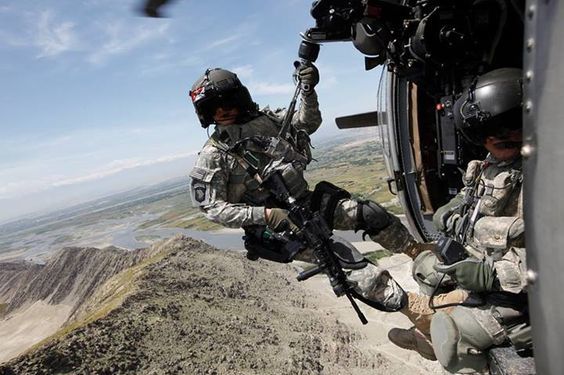 Staff Sgt. Spraktes preparing to be lowered down the hoist. Photo courtesy of Capt. William Martin, California Army National Guard 