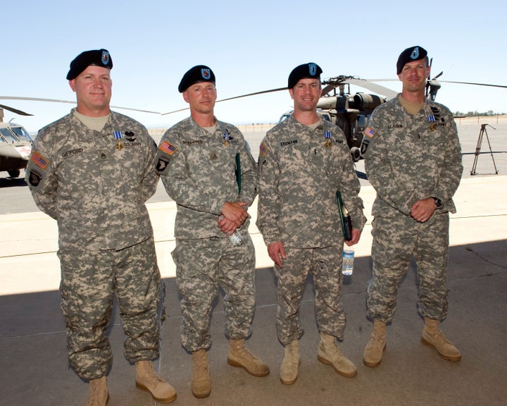 From left to right, Staff Sgt. Thomas A. Gifford, Staff Sgt. Emmett Spraktes, Chief Warrant Officer 4 Brandon Erdmann and Chief Warrant Officer 2 Scott St. Aubin pose for a group photograph after an award ceremony at Mather Airfield in Sacramento, Calif., June 13, 2010. During the ceremony, Spraktes was awarded the Silver Star Medal while Gifford, Erdmann and St. Aubin received the Distinguished Flying Cross with V Device for heroic actions in Afghanistan while assigned to the California National Guard’s Company C, 1-168th General Support Aviation Battalion. (Photo by Sgt. First Class Jesse Flagg, California National Guard)