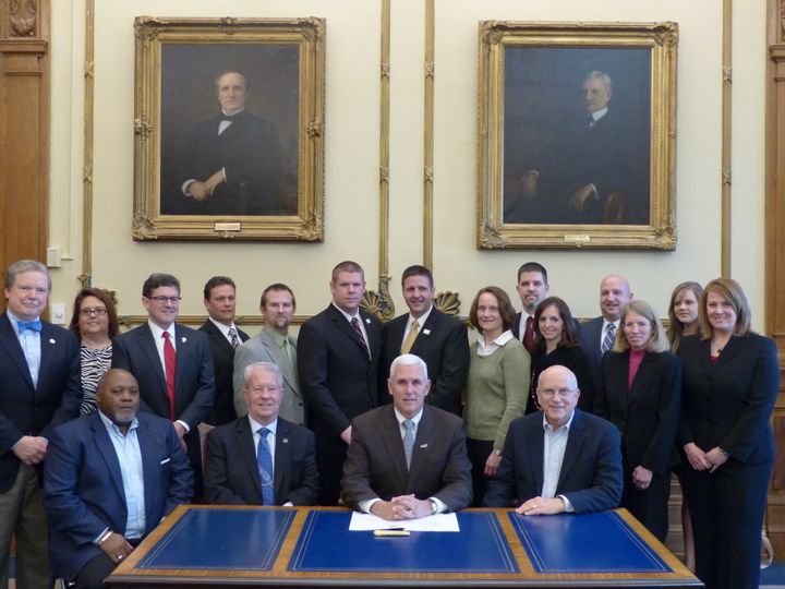 Governor Mike Pence signs the Sudden Cardiac Arrest Prevention Act into Law