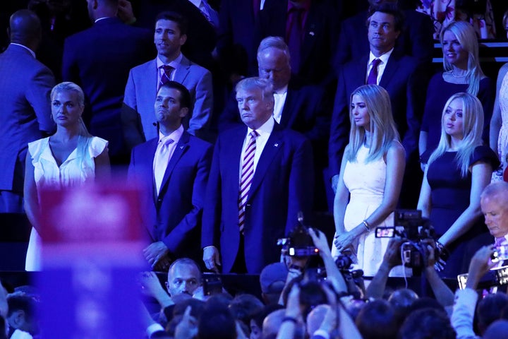 Vanessa Trump, Donald Trump Jr, Republican presidential candidate Donald Trump, Ivanka Trump and Tiffany Trump stand as they listen to Sen Ted Cruz.