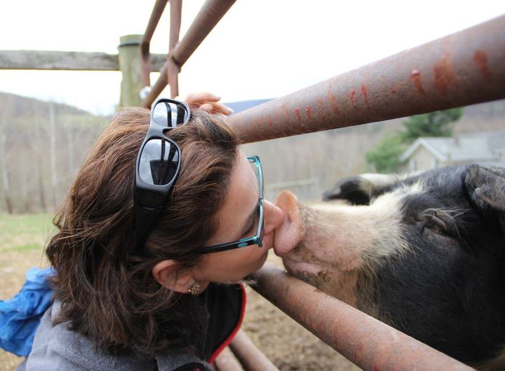 Mahon gives a kiss to her "boyfriend" Eddie Traffic at Indraloka Animal Sanctuary.