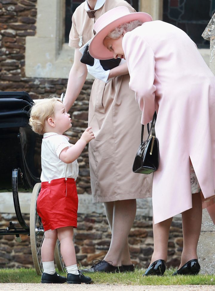 Prince George and Queen Elizabeth II at Princess Charlotte's christening. 