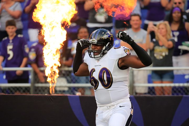 Tackle Eugene Monroe of the Baltimore Ravens is introduced before the start of an NFL pre-season game. August 7, 2014