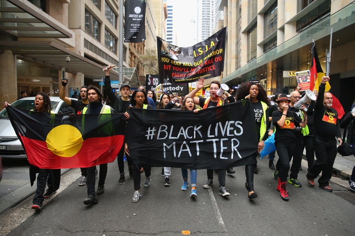 Black Lives Matter protesters march towards Martin Place on July 16, 2016 in Sydney, Australia.