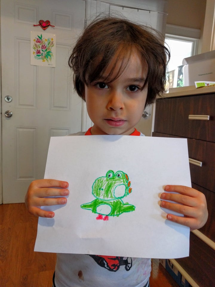 Ralphie with a drawing of his.