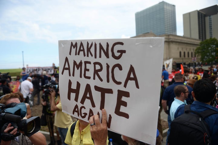 People protest against Donald Trump on the first day of the Republican National Convention in Cleveland, Ohio.