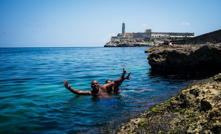 For some residents, pollution in Havana Bay is trumped by the respite it offers on a hot summer day.