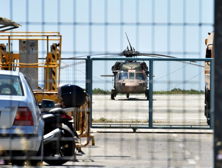 A Turkish military helicopter lands in the northern Greek city of Alexandroupolis with eight men on board who have requested