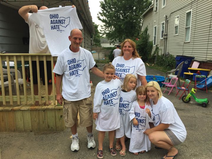 A family in Cleveland, Ohio, shows off their "Ohio Against Hate" T-shirts.