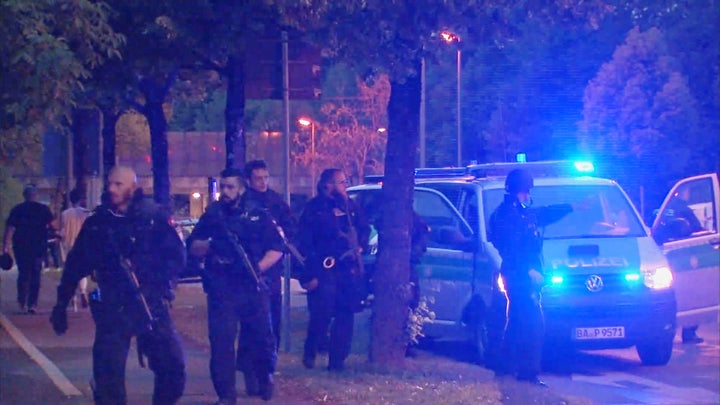 A screen grab taken from video footage shows police officers near the Olympia shopping mall following a shooting rampage in Munich, Germany July 22, 2016.