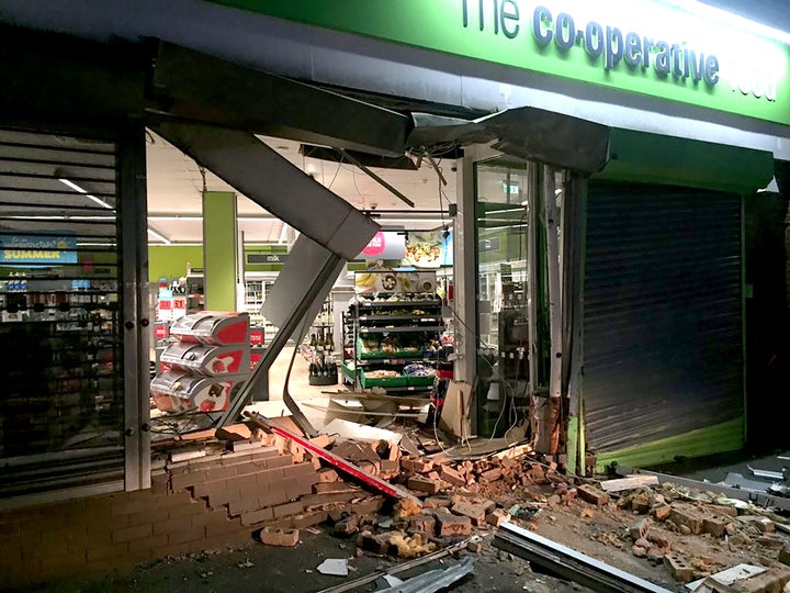 A gang of thieves used a digger to steal a cash machine in Northamptonshire